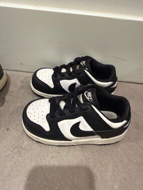 Nike Kids Black and White Low-Top Sneakers with Swoosh